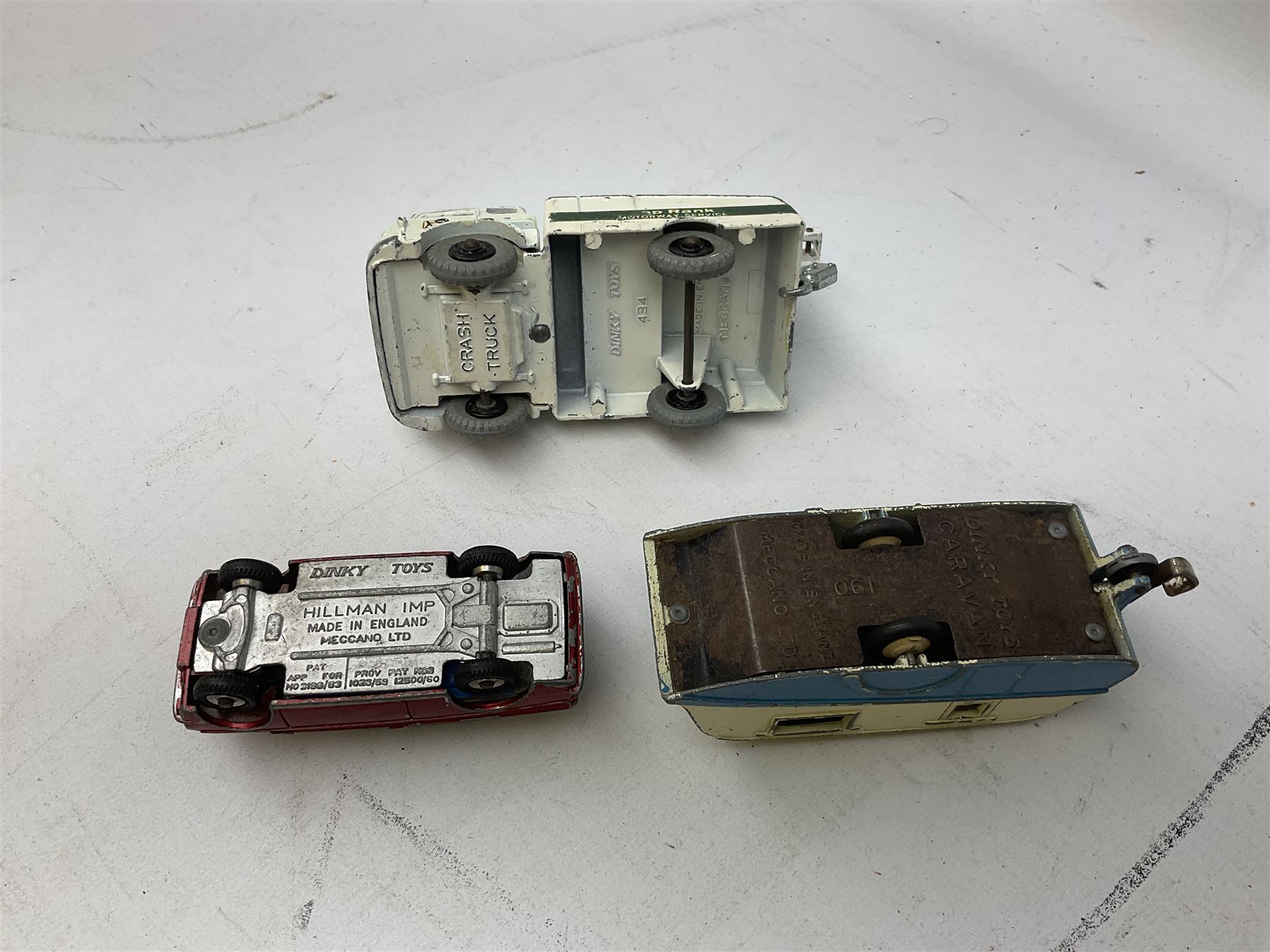 Dinky - twenty-five unboxed and playworn die-cast models including Lady Penelope FAB1, Caravan, Ford Sedan, Triumph TR2, Packard, Austin Somerset, Devon, Healey and Seven Countryman etc (25)