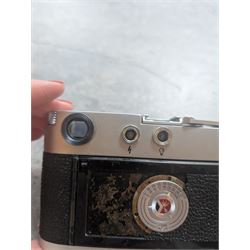 Leica DBP M3 35mm rangefinder camera body, serial no. 1038356, circa 1961, in chrome finish, housed in brown leather Leica case, with a Leitz Wetzlar Sunnilux 1:1.4/50 lens serial no. 1845148, Leitz Wetzlar Elmar 1:4/135 lens serial no. 1825980, 12575N hood, 12521G hood, Leica Meter MC serial no. 99015, Sunpak Auto28 SR Thyristor, Linhof 3 Way Pan tripod, and a Toshiba PE-1 Linear Exposure meter, all housed in an Original Benser Everready Case, most items with instruction booklets 