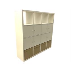 Ikea white wall unit, fitted with shelves, cupboards and sliding fabric storage boxes