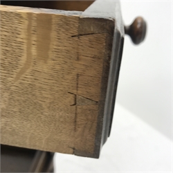 Early 20th century oak tea trolley, carved cup and cover supports joined by solid undertier, W76cm, H81cm, D82cm