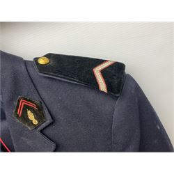 Mid 20th century French Ugeco Nantes first class dress navy blue uniform with ribbon bar with cap, and quantity of Sapeurs Pompiers patches, Sapeurs Pompiers de Caen belt buckle etc