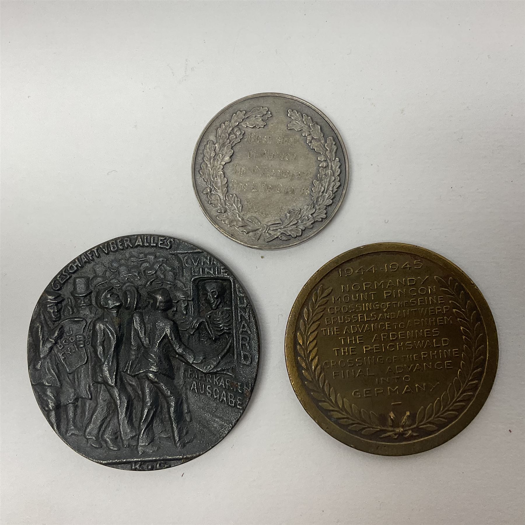 RMS Lusitania iron medallion dated 5th May, 5.5cm diameter, boxed with St Dunstan's Blinded Soldiers Profit paperwork; another unboxed similar Lusitania medallion; 30th Corps Alamein Cuxhaven medallion; Battle of Jutland 1916 silver memorial pendant; Navajo Code Talkers medallion 2000; and five other military related medallions