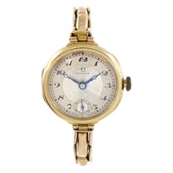 Omega early 20th century 9ct gold manual wind wristwatch, silvered dial with Arabic hour m...