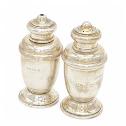 1930s three piece silver cruet set, comprising mustard pot with cover, salt and pepper shakers, together with 1960s toast rack and open salt, both hallmarked 