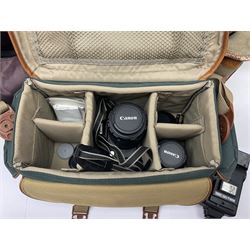 Cameras and accessories, to include Olympus OM101 Power Focus camera body, serial no 1076067, with 'Sigma AF Zoom 1:38, f=75 200mm' lens, serial no 2053714, Canon EOS 5000 camera body, serial no 1507812, with 'Canon Zoom EF 80-200mm, 1:4.5-5.6' lens, other cameras, by Miranda, Coronet and Ricoh and a collection of lenses, carry cases, etc 