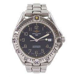 Breitling gentleman's stainless steel automatic wristwatch, Ref. A17035, rotating bezel, black dial with date aperture, on original stainless steel strap