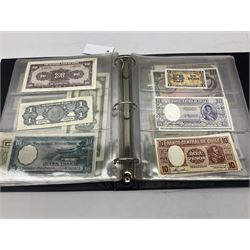 World banknotes, including Queen Elizabeth II The States of Jersey one pound 'DB202703', five pounds 'BB527762' and ten pounds 'AB651481', reserve bank of New Zealand two dollars '1L3 741894', King George V Straits Settlements one dollar 1st January 1935 'F/83 28924', various Bank of England notes etc, housed in two ring binder albums