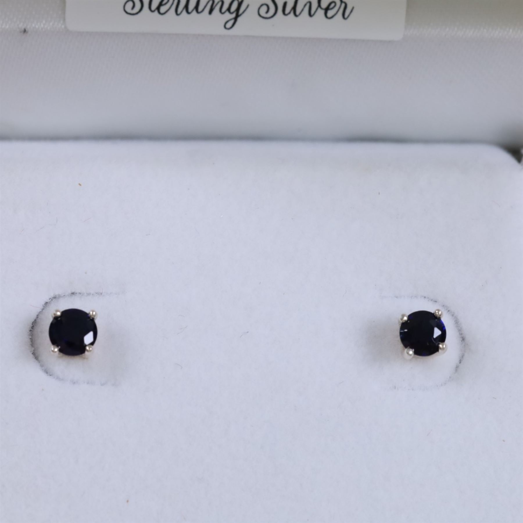 Pair of silver sapphire stud earrings, boxed