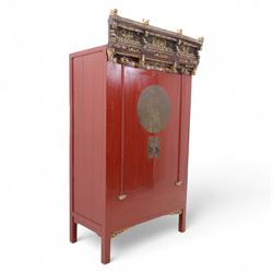 Early 20th century Chinese lacquered marriage cabinet, of rectangular form in red lacquer,...