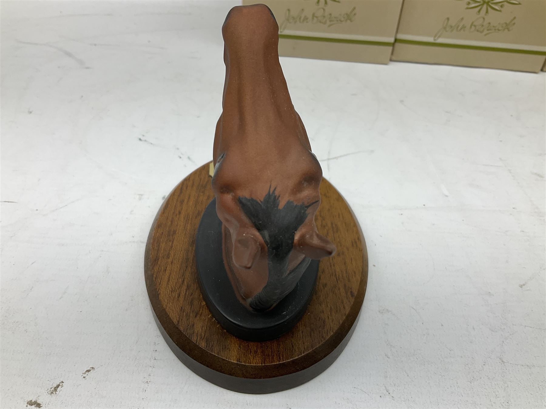 Beswick set of horse head wall plaques 'Champions all', comprising Arkle no.2700, The Minstrel no.2701, Red Rum no.2702, Troy no.2699, all with original boxes