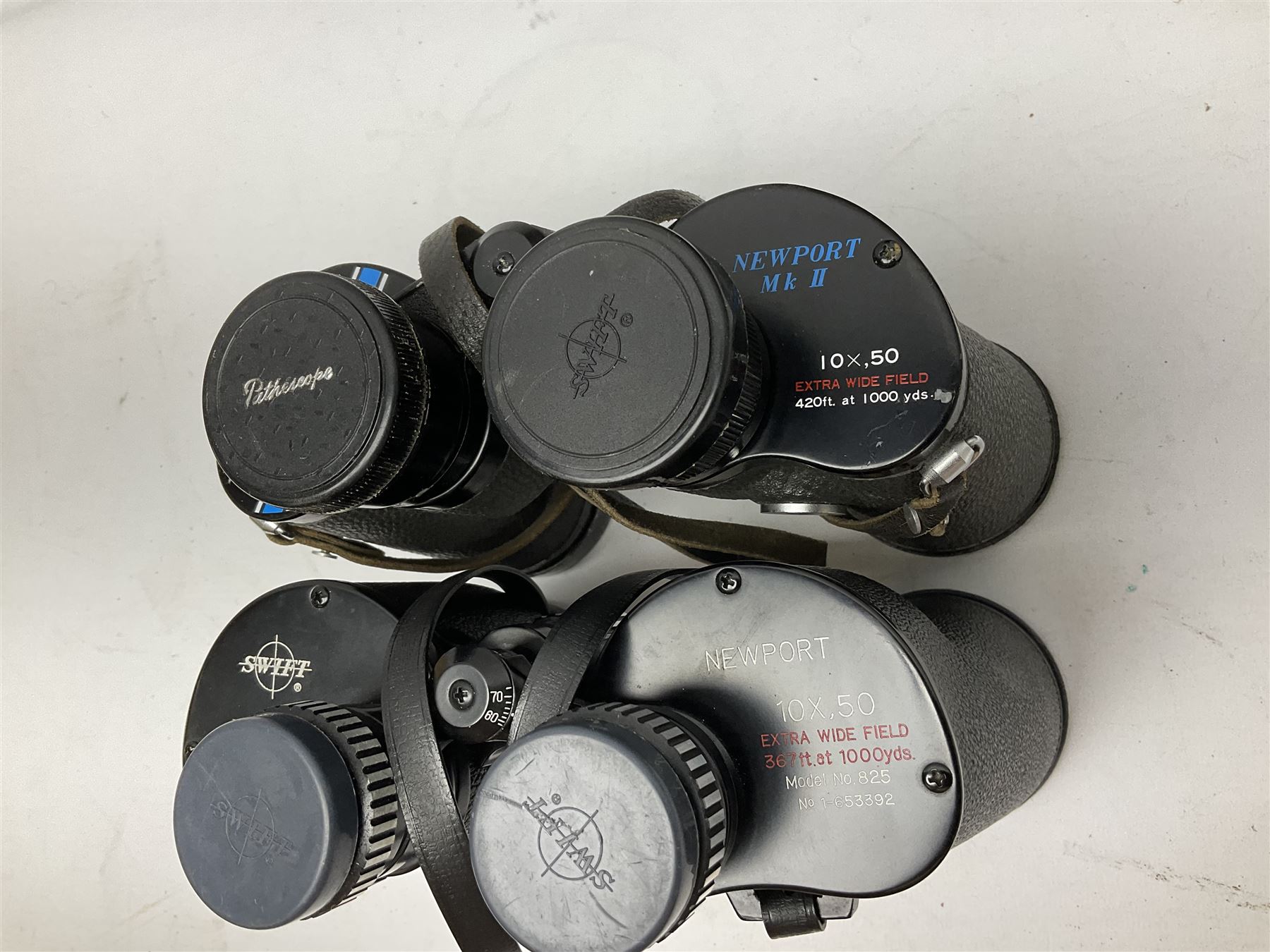 Eleven pairs of Swift binoculars, to include Greens 8x40, Saratoga 8x40, two pairs of Newport Mk II 10x50, Newport 10x50, Saratoga Mk II 8x40, Audubon 8.5x44, etc, 