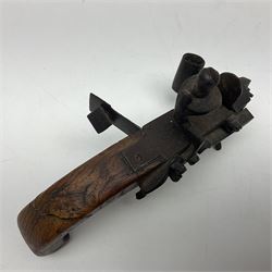 Late 18th/early 19th century flintlock tinder lighter, the steel box lock with hinged door to the left side, elm butt with plain bar trigger, the left side set with a candle sconce and bipod front support, L16cm.