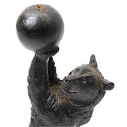 Black forest carving of a circus bear, holding aloft a ball, standing, H35cm