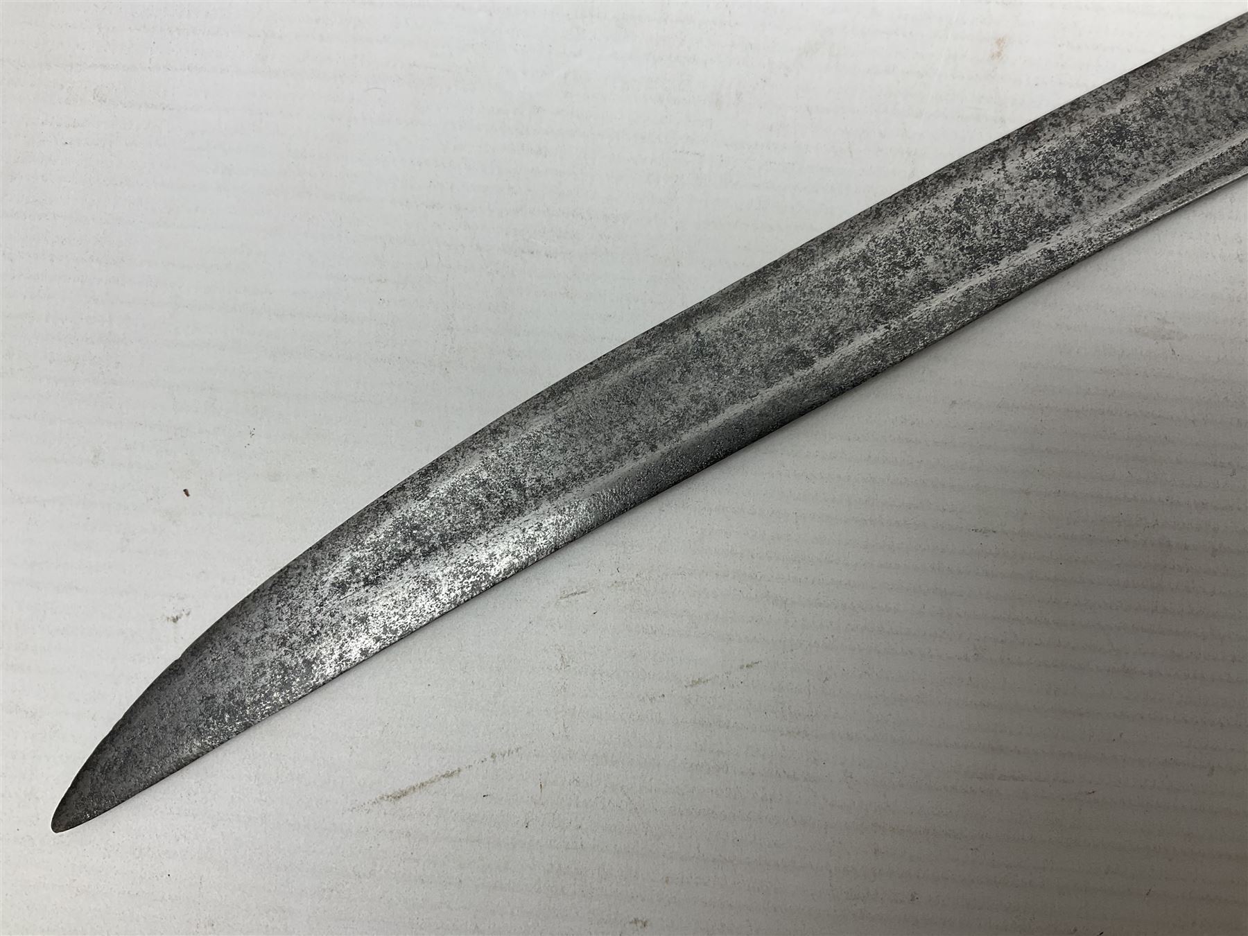 Late 18th century sword, the Spanish 79.5cm curving fullered blade engraved with the Royal Cypher, battle trophies and 'Viva Espania' banner, French Sabre de Mineur brass three-bar hilt with ebonised reeded grip L93.5cm overall (no scabbard)