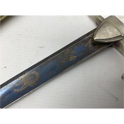 French 1st Empire Superior Cavalry Officer's sword, possibly by Hoppe, the 73cm slightly curving fullered blade with engraved decoration and remains of bluing and gilding, silver plated brass hilt with reeded knucklebow, triangular langets and mother-of-pearl grips; in silver plated brass scabbard with two suspension rings L91cm overall