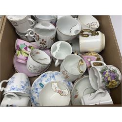Collection of 19th century and later moustache cups, mostly with matching saucers, including hand painted examples