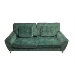 Alstons - large two seat 'Savanna' sofa, upholstered in emerald green velvet with buttoned back cushions, on tapered feet