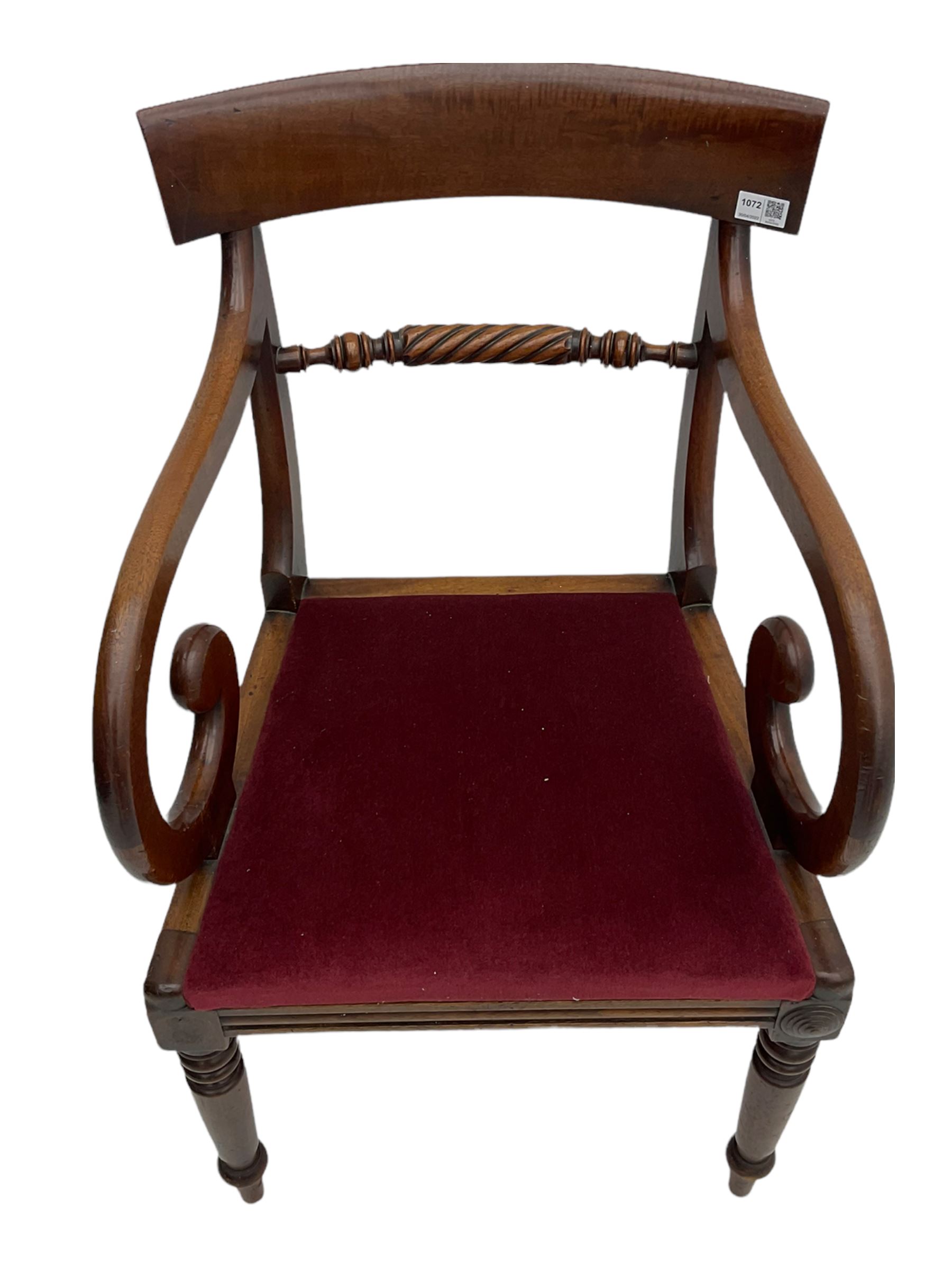 Seven early 19th century mahogany dining chairs - set six side chairs with scroll carved middle rails (W46cm), and a carver elbow chair with rope twist middle rail