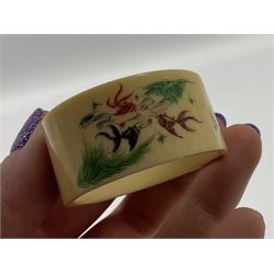 Set of six early 20th century Chinese ivory napkin rings decorated with figural scenes and calligraphy