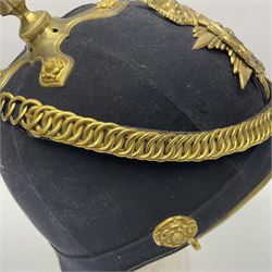 Post-1902 Welsh Regiment Officer's Home Service Blue Cloth Helmet with gilt metal King's crown helmet plate to the front, a removable spike to the top on a shaped cruciform base with rosette fittings, rosette side bosses, brass trim to the front peak, and leather and velvet backed chin scales, with sweat band, the interior with the remains of a makers label at the address 1,3 & 5 Lexington Street, Golden ? London W (presumably Hobson & Sons)