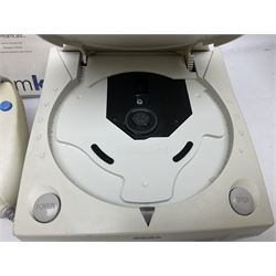 Dreamcast console, one controller, original instruction booklet with magazine and four games, ‘Aerowings’, ‘Buggy Heat’, ‘ Racing Simulation Monaco Grand Prix’ and ‘Who Wants to be a Millionaire’, all in original cases with instruction booklets 
