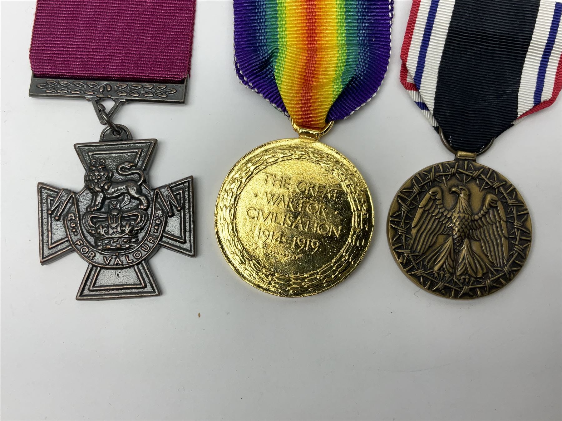 Gaunt & Son Territorial Force Nursing Service cape medal; cased; WW1 British War Medal and 1914-15 Star (names erased); two MID oak leaves; Polish and American medals; eight replica medals including VC, MM, Air Crew Europe Star etc and replica group of five WW2 miniatures etc