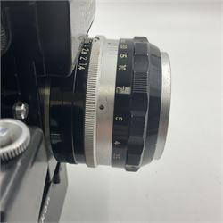 Nikon Photomic TN NKJ camera body, serial no 6728309, circa 1965, with 'Nippon Kogaku NIKKOR-S Auto 1:1.4 f=5.8cm' lens, serial no. 173909, Nikon F36 Motor Drive, serial no.132430 and Nikon cordless battery pack