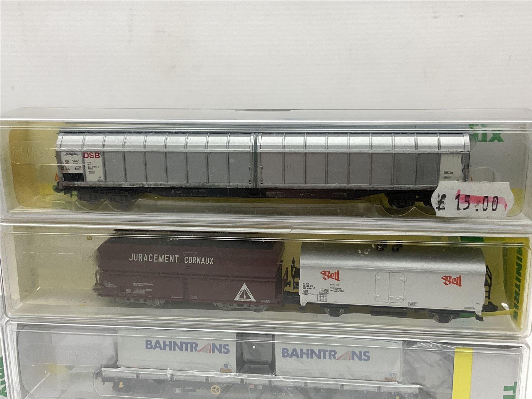 Trix Minitrix 'N' gauge - four goods wagons - Nos. two 13575, two 15518, 15254-10, 15254-19, 15645-10, 15645-12, two 15271-14, two 15271-15, 15271-16 and 15271-18; all boxed; and two unboxed in associated box (16)