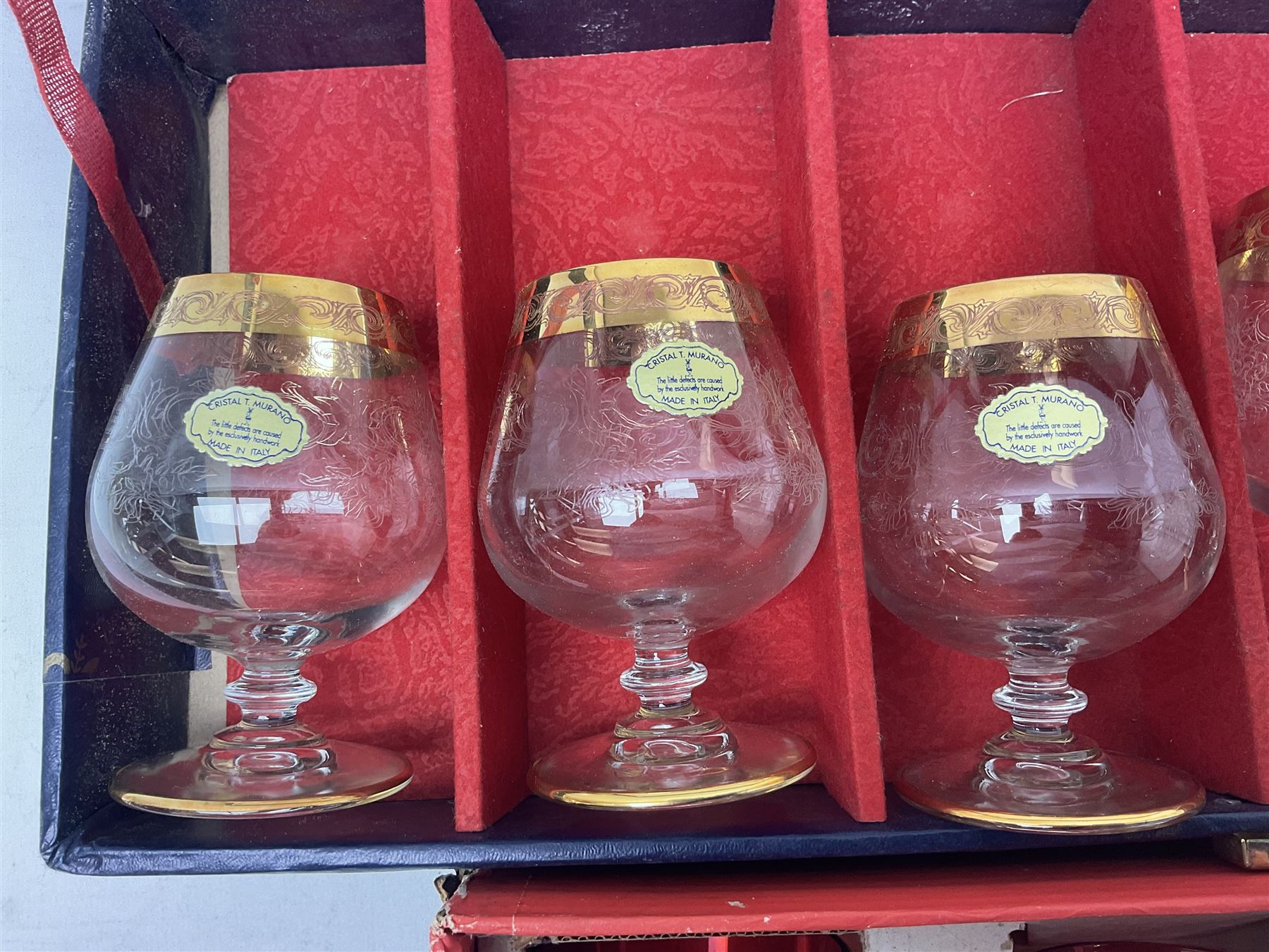 Set of six Murano brandy glasses with gilt rims, together with six