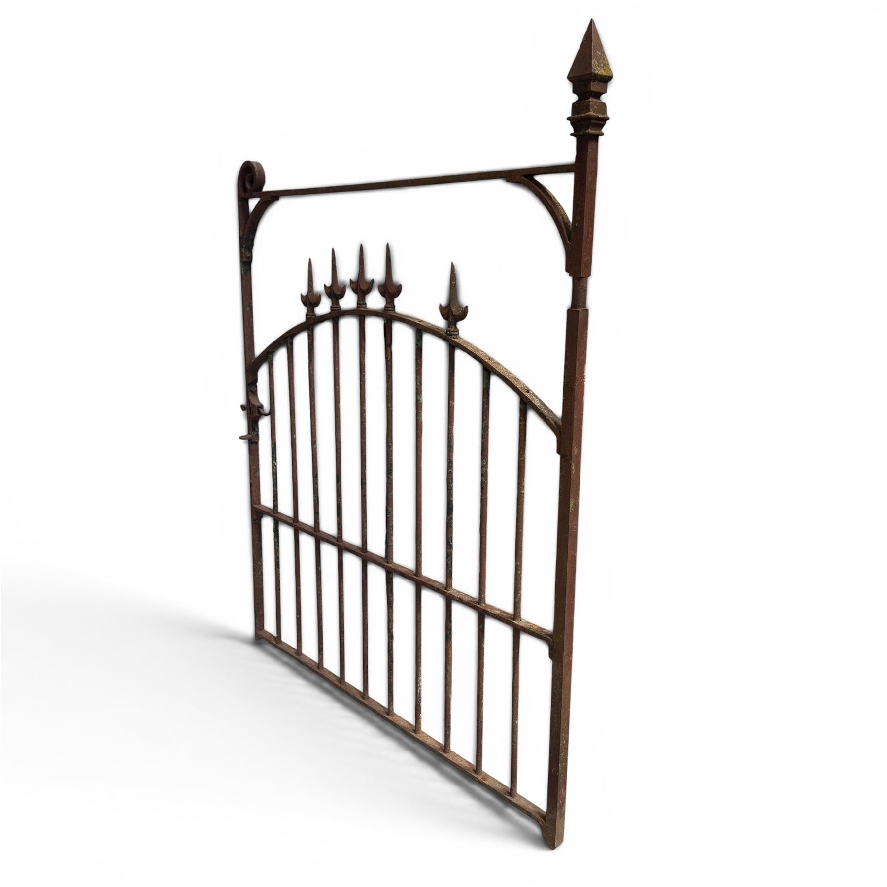 Georgian wrought iron single garden gate, pointed finial over strapwork cresting rail and arched profile with spearhead finials, the opposing side with scrollwork and hinged latch