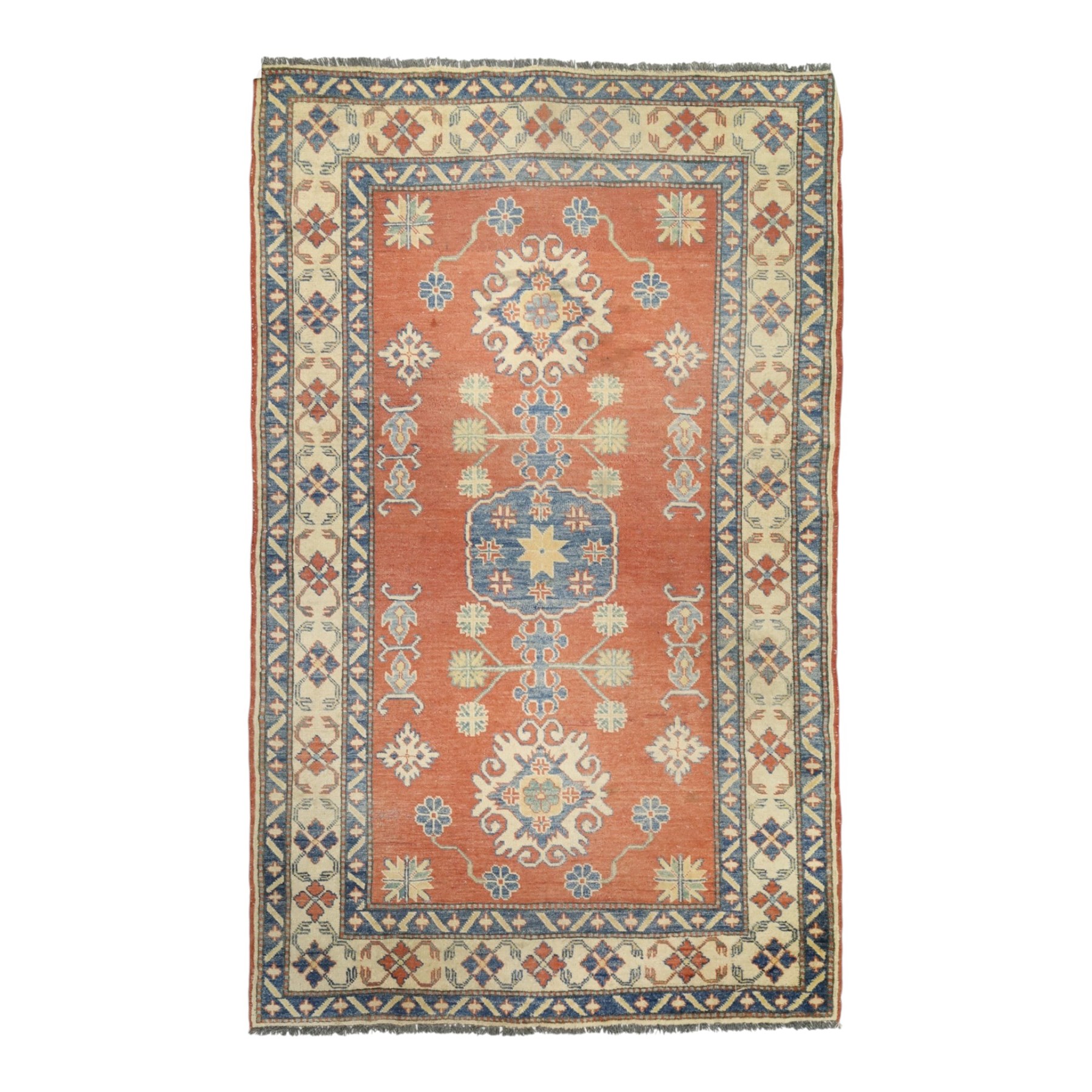 Persian Kazak vermillion ground rug, decorated with a foliate pole medallion with surrounding geometric and plant motifs, the guard bands with repeating floral and geometric design