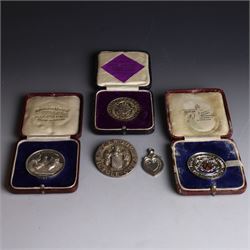 Collection of silver medals, mainly with an agricultural theme, including Poultry Club, Heywood Bicycle Club, heart shaped fob, four within leather cases 