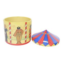 Dennis Chinaworks circus tent jar, designed by Sally Tiffin, the body decorated with clowns, upon a yellow ground, the lid decorated as a circus top, limited edition 12/25, impressed and painted marks beneath 