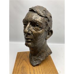 Bronze portrait bust of a man, the hollow cast figure raised upon square wood plinth and signed to reverse G. Abouaf, H46cm