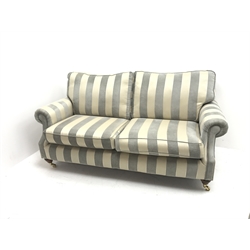 Alstons two seat Amberley sofa upholstered in grey and pale gold stripes, turned supports on castors (W195cm) and two matching armchairs (W92cm)