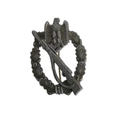 Two Third Reich WWII German assault badges, Infantry and General, together with American paratrooper jump wings