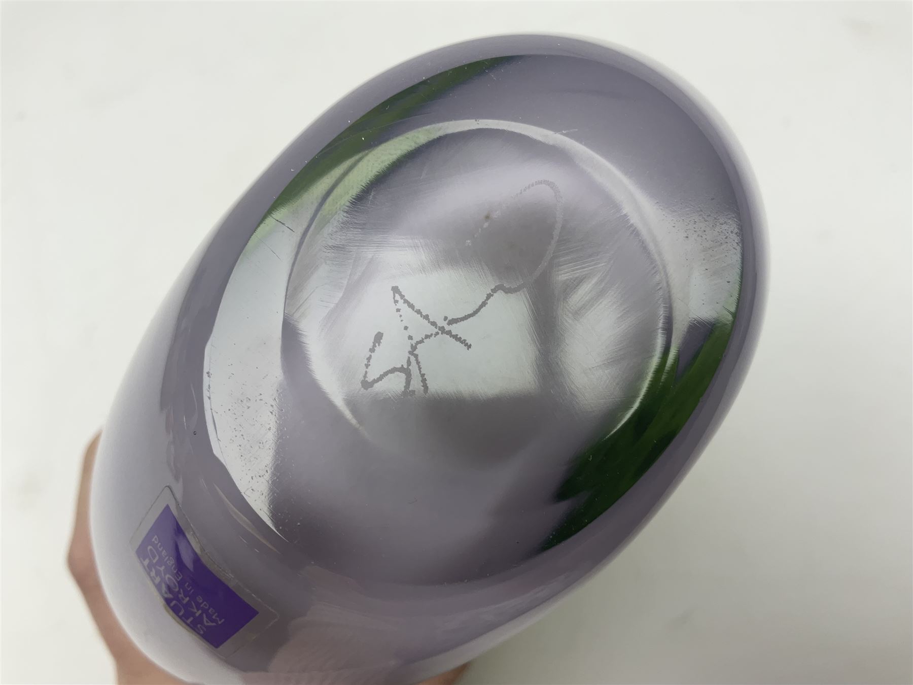 Stuart Akroyd glass vase, green banded top and opaque purple lower section with bubble inclusions, with sticker and engraved signature beneath, H25cm