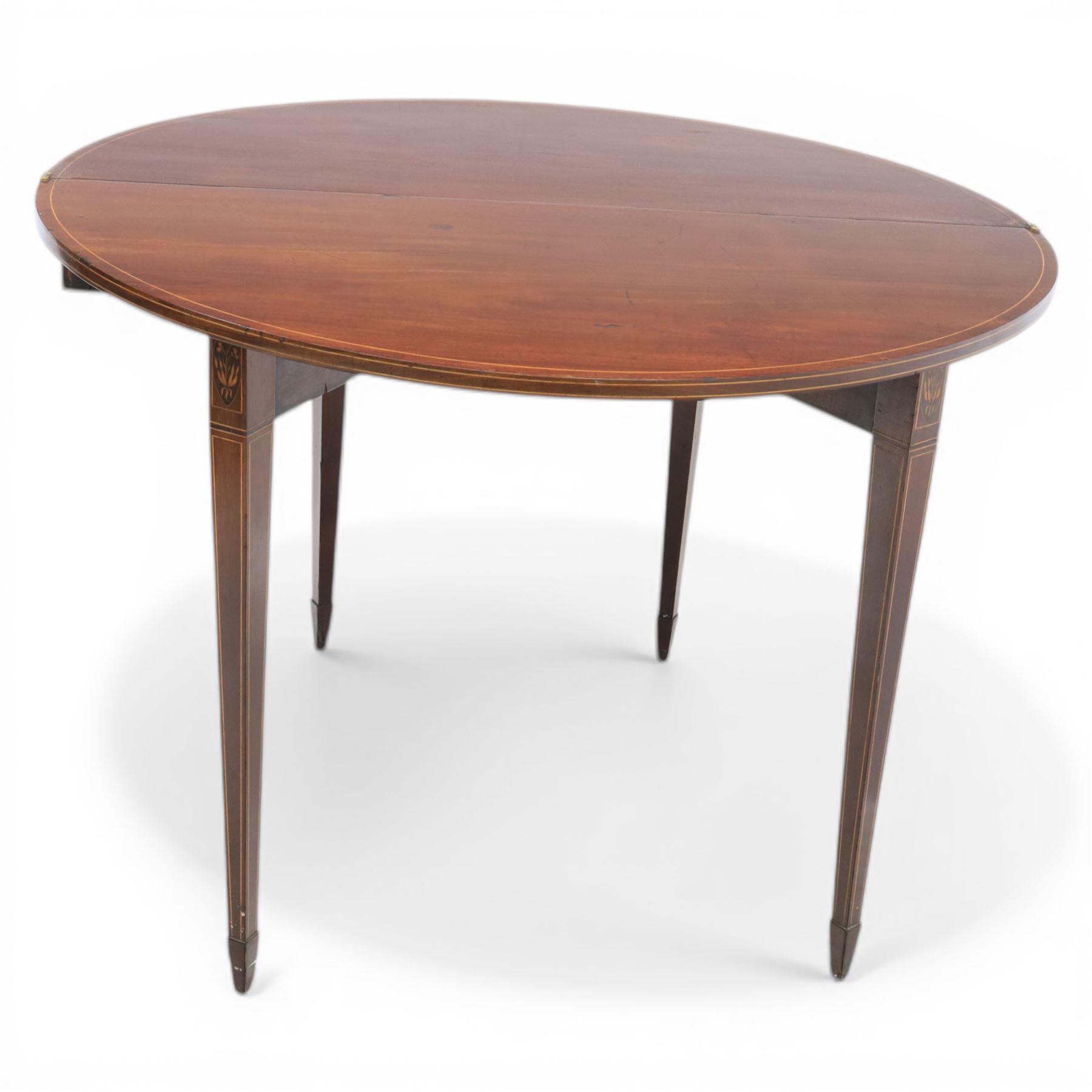 George III Scottish inlaid mahogany demi lune tea table, the curved fold over top opening to reveal a circular top with inlay to edge, above a frieze drawer with key, raised upon tapering inlaid legs with spade feet