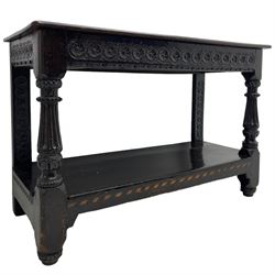  17th century oak buffet or side table, moulded rectangular top over guilloche carved frieze rails and rear upright supports, turned and flute carved front supports united by under tier