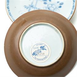 Pair of 18th century Chinese blue and white ‘Nanking Cargo’ saucer dishes painted with bamboo and peony, with Christie's lot label No 5258 D11.5cm