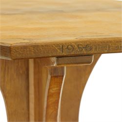 Mouseman - 1950s oak coffee table, octagonal adzed top on cruciform base and sledge feet, carved with mouse signature, dated 1956 and engraved 'Sylvia' to the top edge, by Ken Almack of the workshop of Robert Thompson, Kilburn

Notes:
Made by Ken Almack at the Robert Thompson workshop, Kilburn, where he trained and worked as a Mouseman craftsman; brother of Colin ‘Beaverman’ Almack, who later established his own workshop. The table was made for Sylvia to mark their engagement in 1956, prior to their marriage in 1957.

Provenance: The estate of Ken Almack; Tennants Auctioneers, 20th Century Design, 5 October 2024.