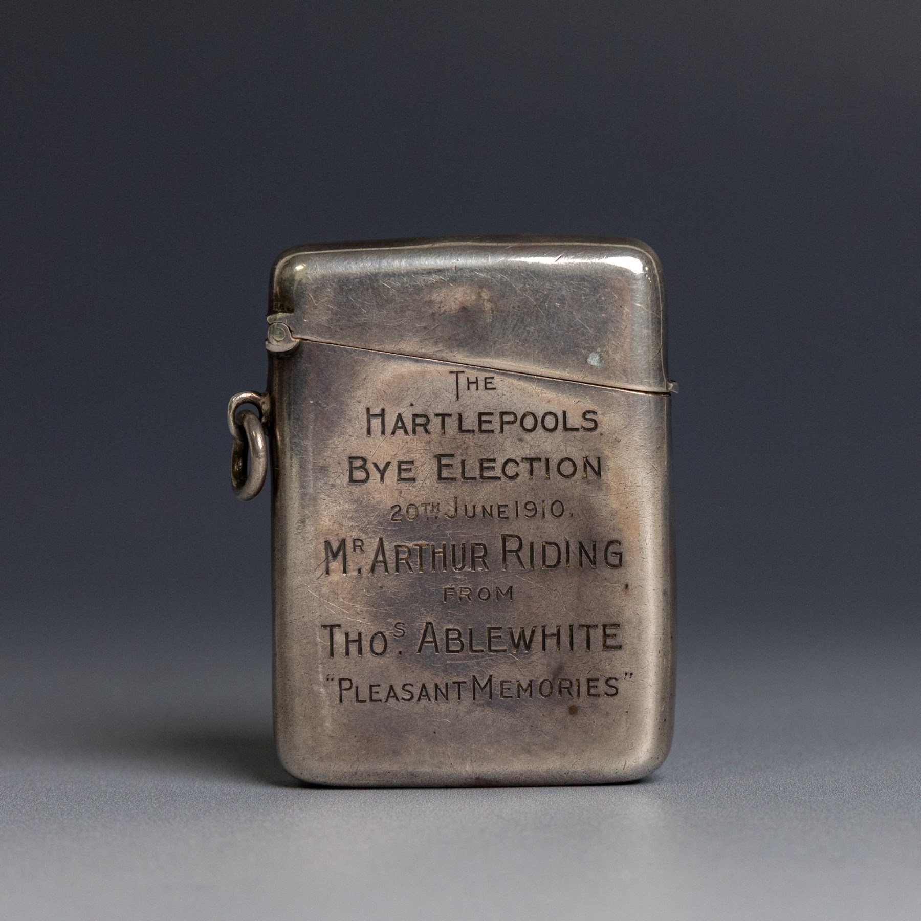 Edwardian silver vesta case, with presentation engraving reading 'The Hartlepools Bye Election 20th June 1910 Mr Arthur Riding from Tho.s Alblewhite Pleasant Memories', hallmarked 	William M Hayes, Birmingham 1909