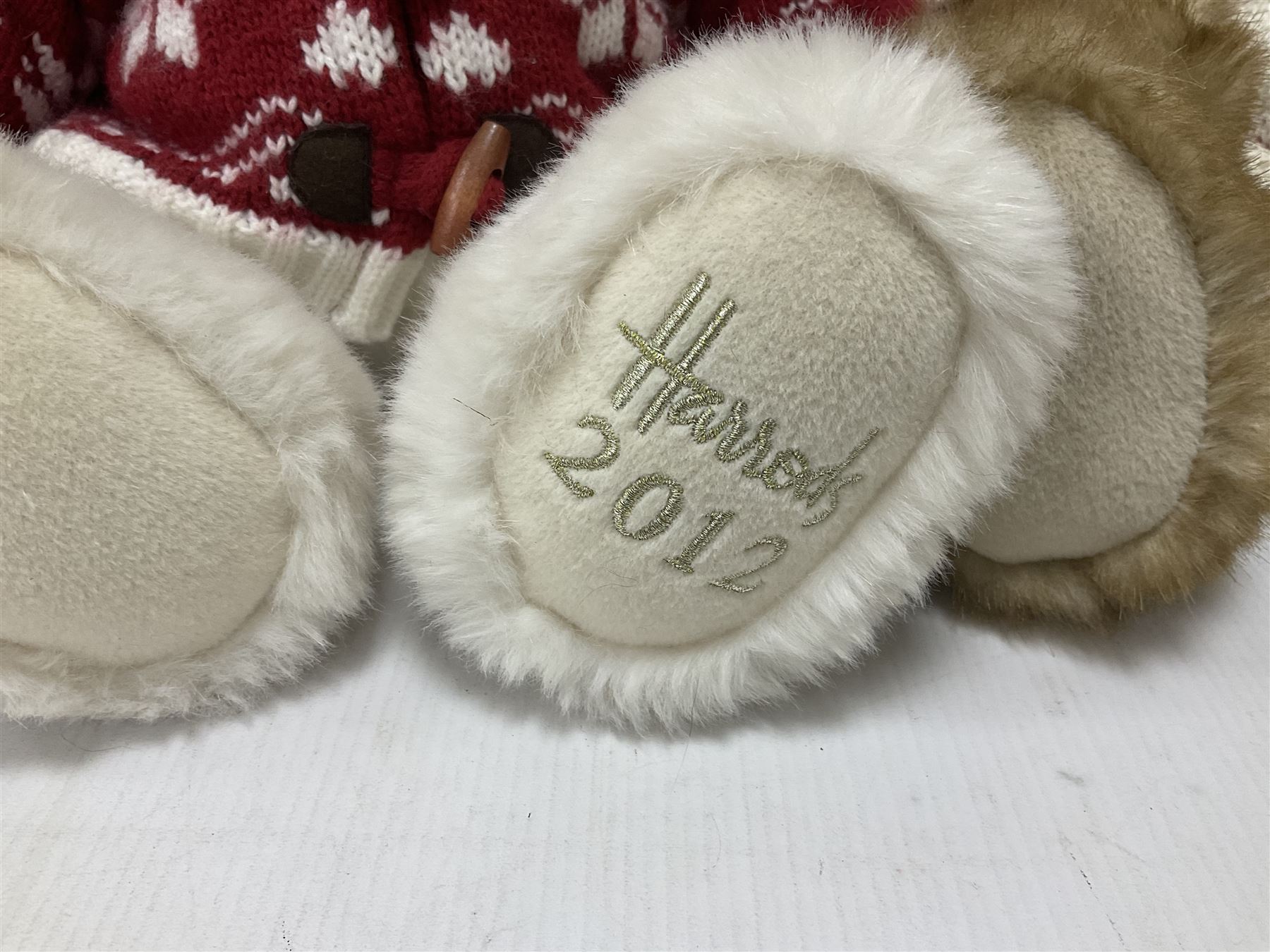 Six Harrods annual teddy bears, dating between 2011 and 2016, tallest H38cm