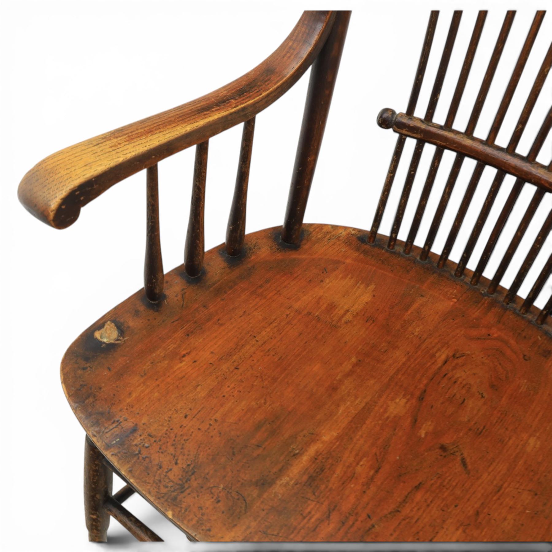 Set of three 19th century ash and elm spindle back Windsor armchairs, arched top rails above fan-shaped spindle backs, curved arms with turned supports, shaped saddle seats, on turned legs joined by H-stretchers