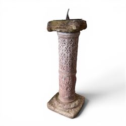 Weathered cast stone sundial, shaped top with metal dial, patterned column
