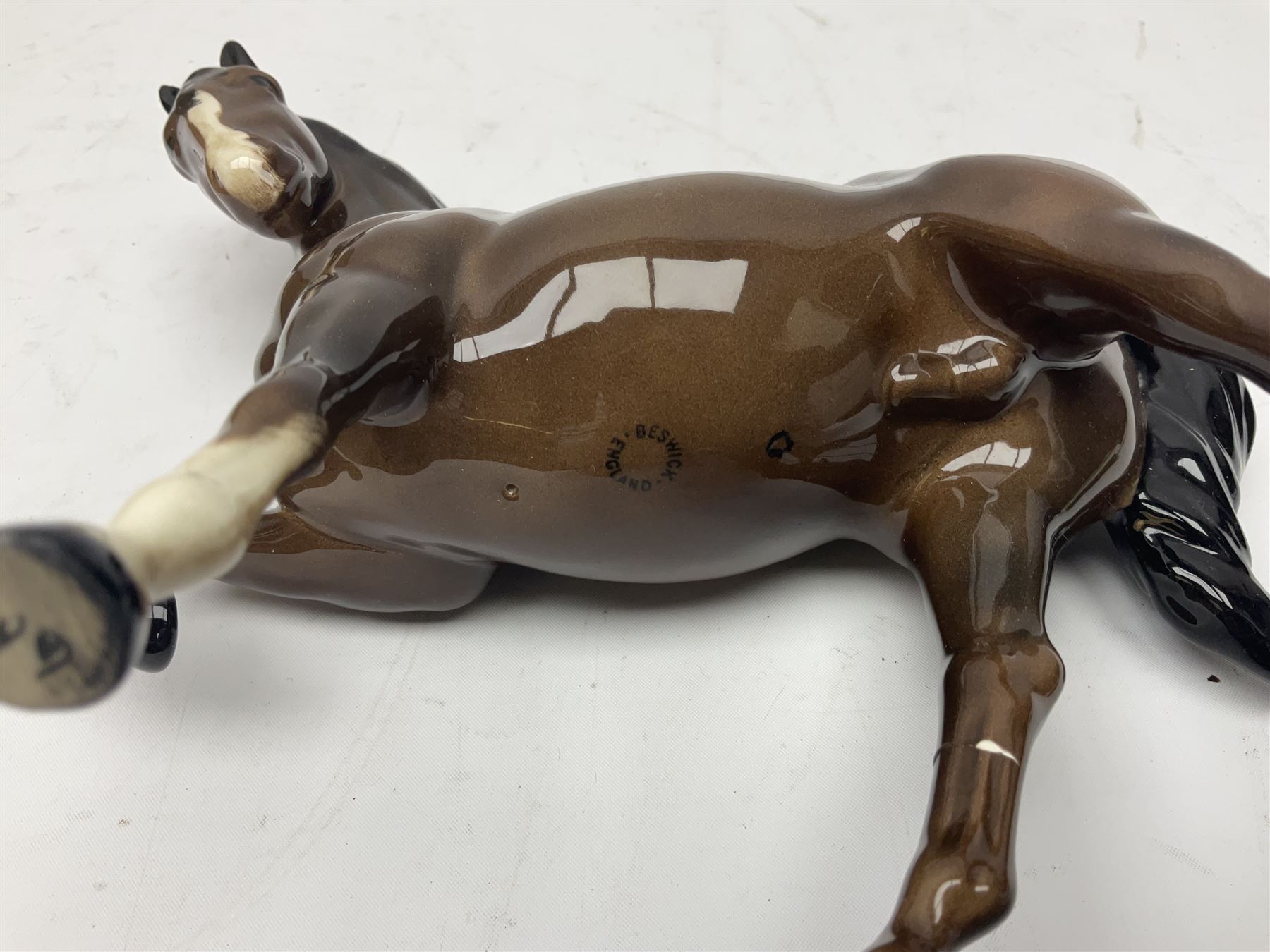 Four Beswick horses, including Exmoor no 1645, Black Beauty foal and two others 