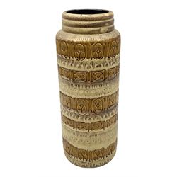 West Germany pottery vases of cylindrical form with brown and cream moulded decoration, with impressed marks beneath, H42cm