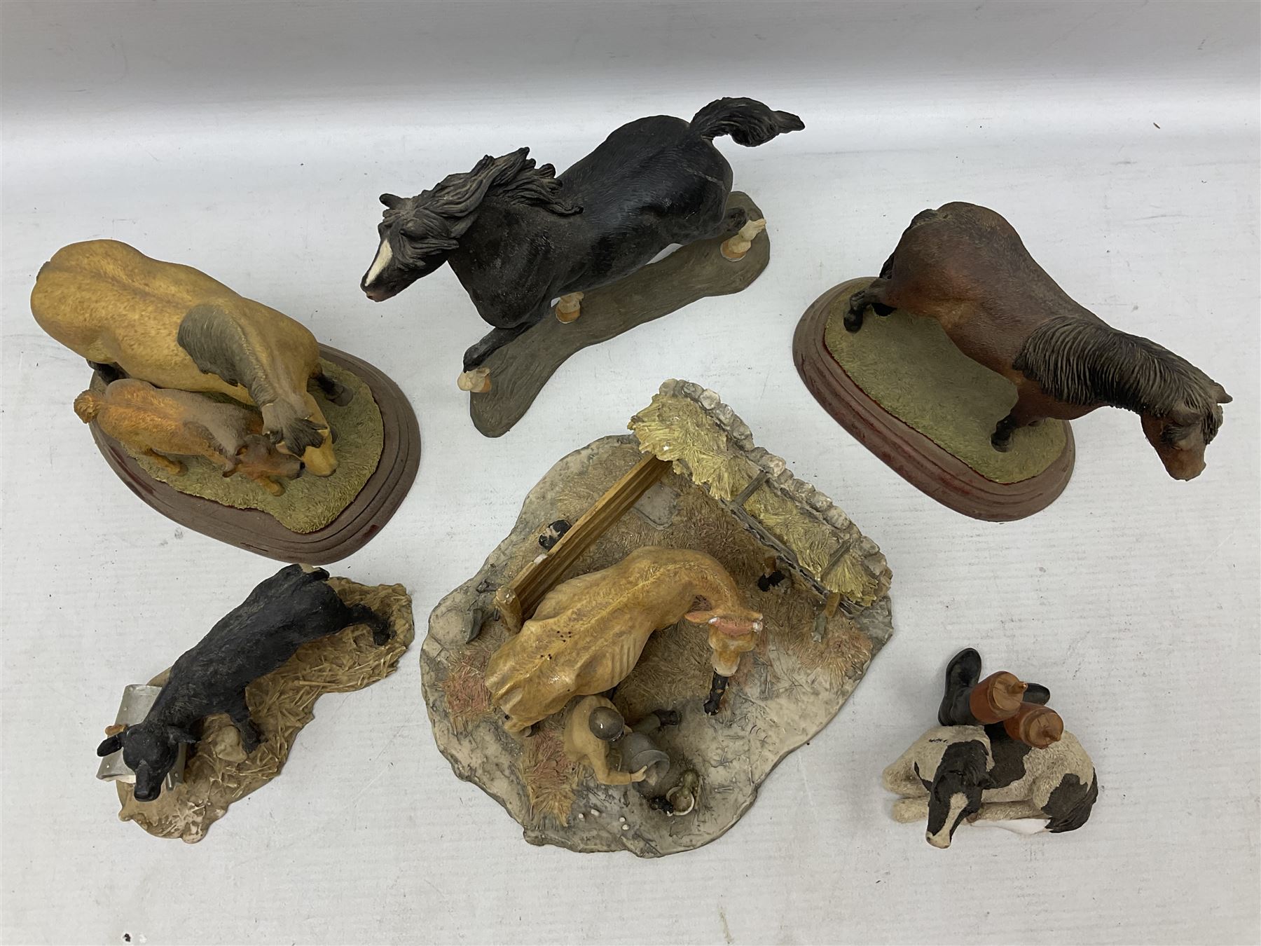 Collection of Border Fine Arts figures, comprising Exmoor Stallion A4058, Highland Mare & Stallion A2691, Welsh Cob A20804, On The Farm A0167, calf figure with bucket and figure group of cow and farmer with cat and kittens (6)