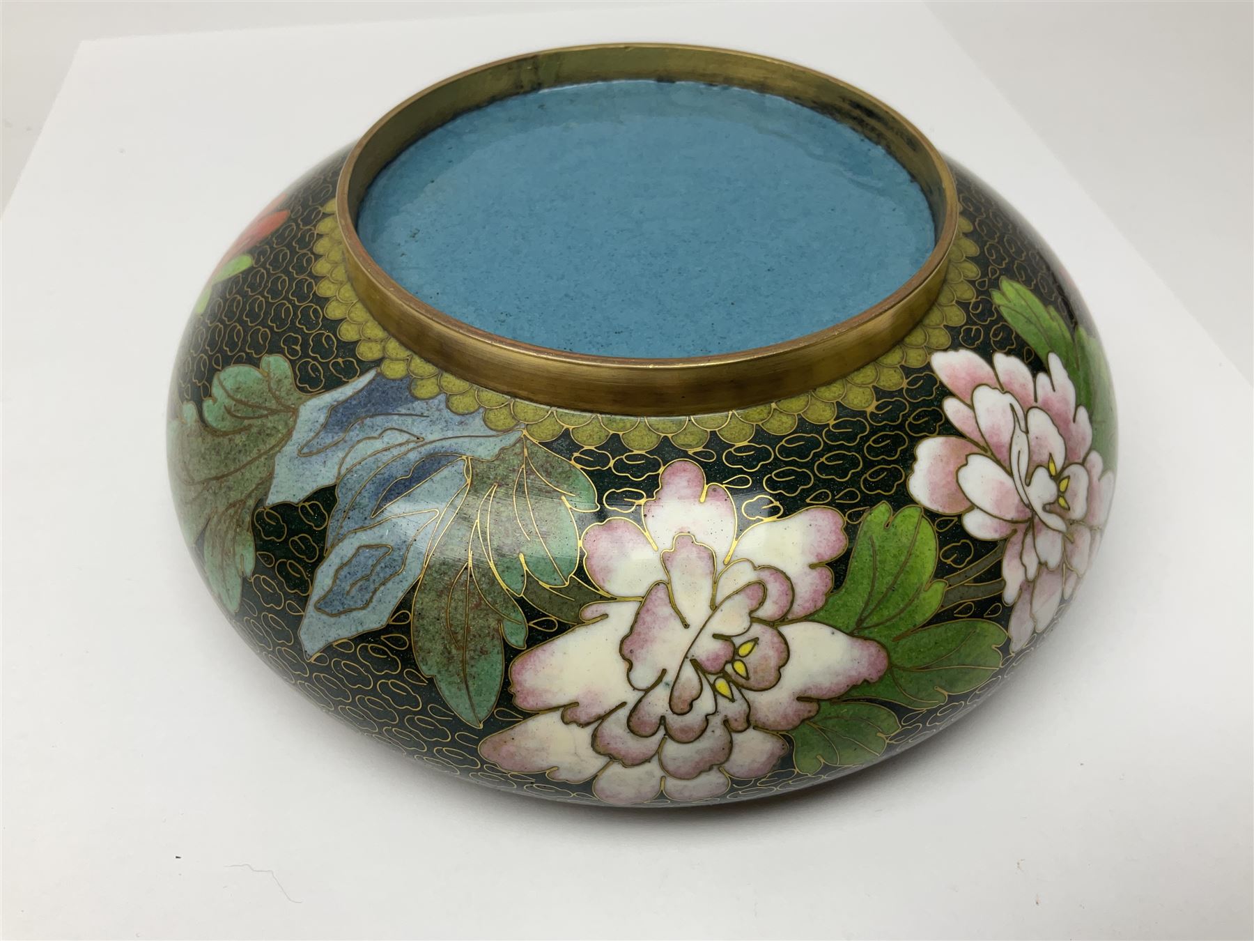 Pair of modern cloisonne ginger jars having floral decoration with a green ground, with hardwood stands, together with a similar plate and a bowl decorated with birds and flowers  