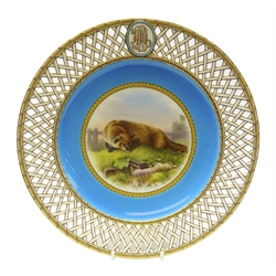  Late Victorian Minton monogrammed cabinet plates hand painted after Edwin Landseer 'Not Caught Yet' depicting a fox circling a trapped rabbit, attributed to Henry Mitchell, on turquoise ground within a pierced gilt basket weave border, with A.B. Daniell and Son retail stamp, c1879, pattern no. G739, D25cm. Provenance Property of Bob Heath, Brandesburton Formerly of Ravenfield Hall Farm near Rotherham  